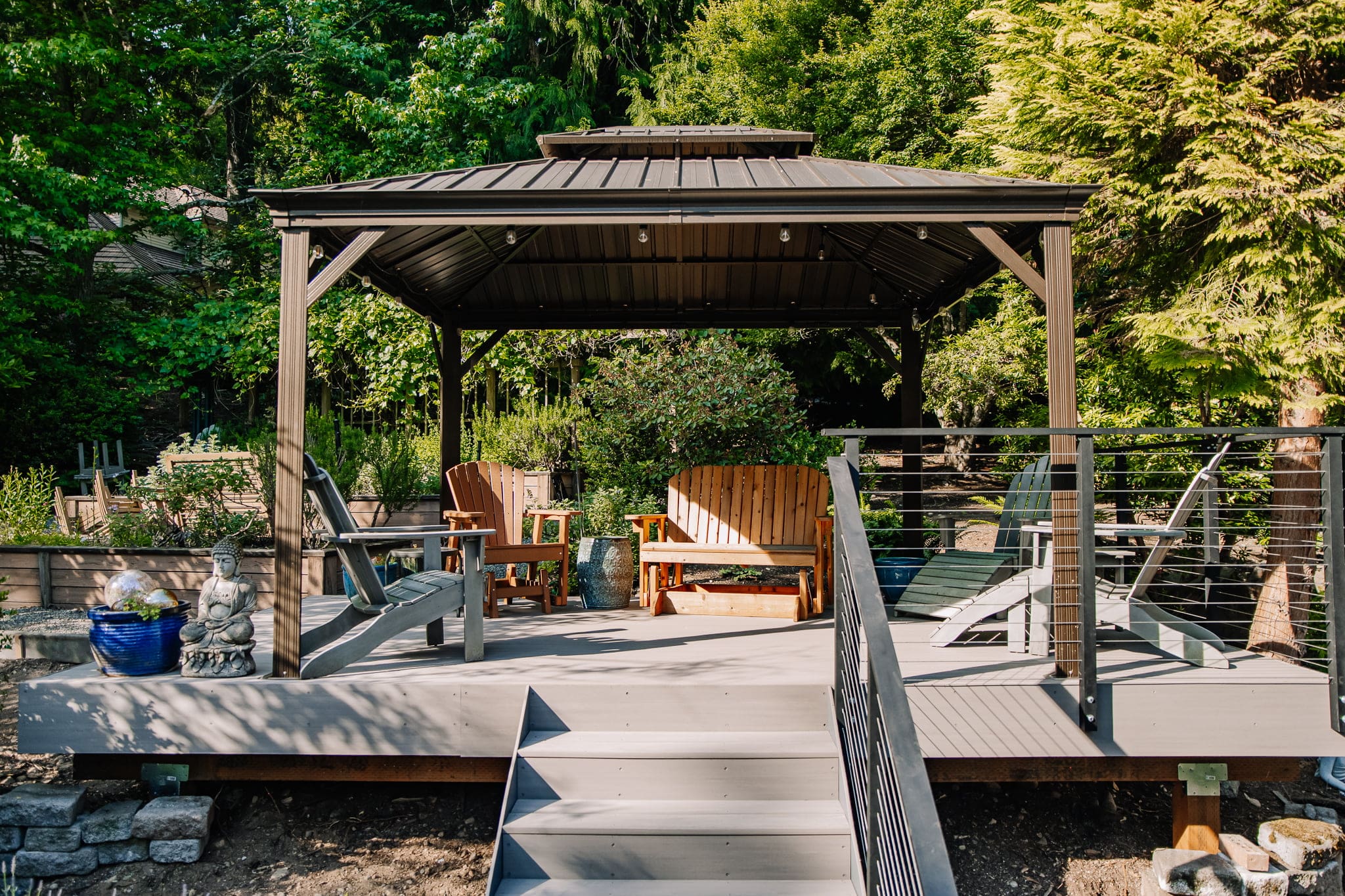 Covered deck with comfortable outdoor furniture, perfect for all-weather entertaining