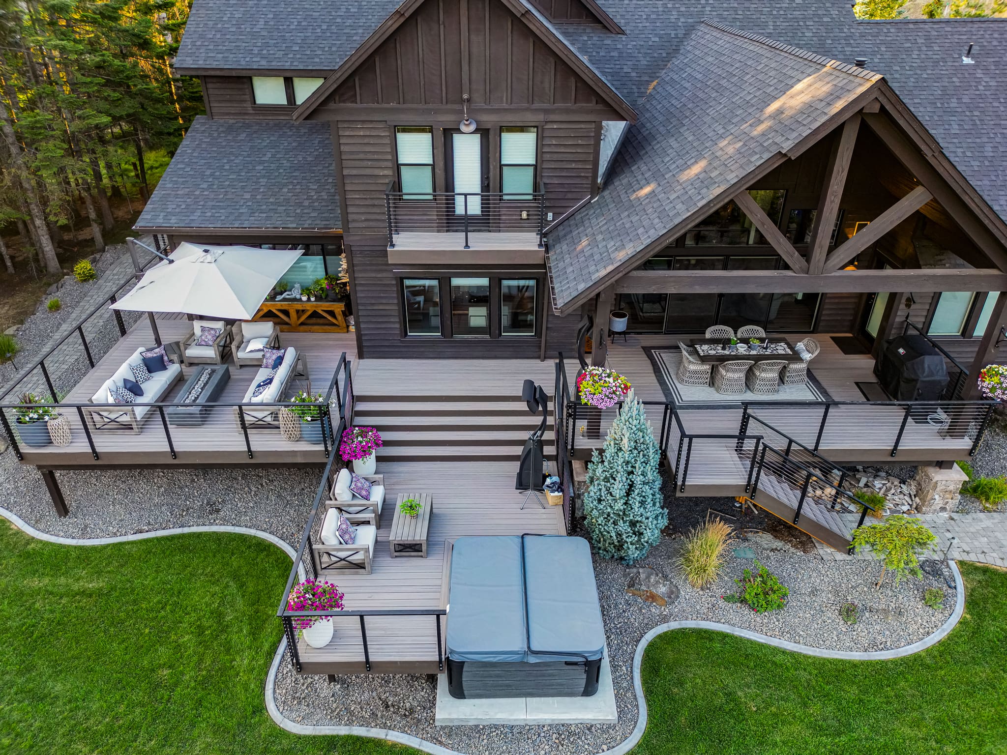 Modern wooden deck with seating and greenery