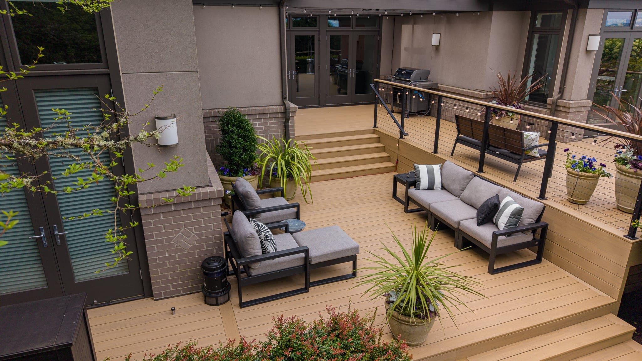 Modern multi-level backyard deck with outdoor seating