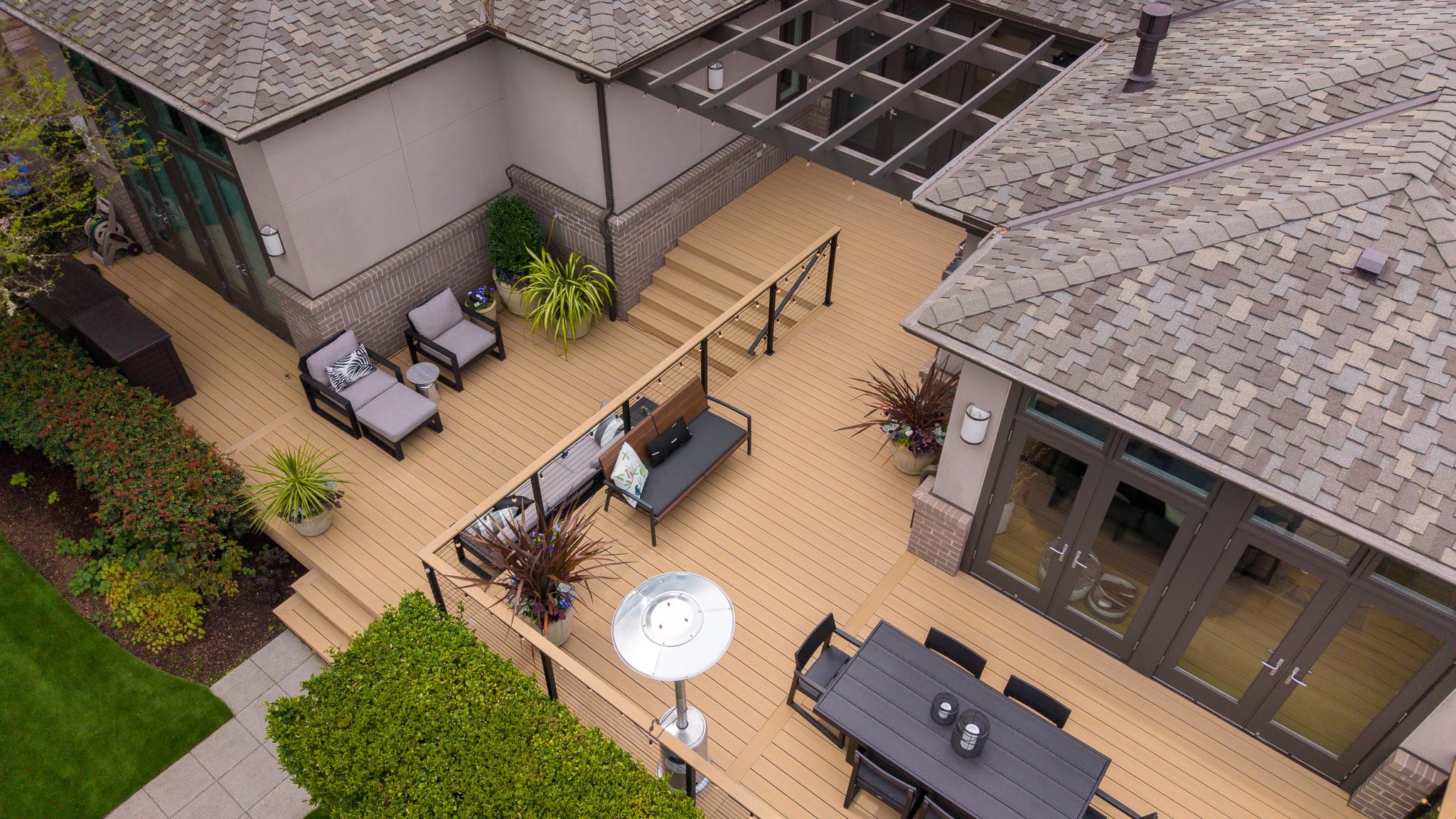 Modern home with spacious wooden backyard deck